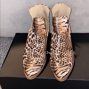 She’s a wild sole leopard mix print bootie